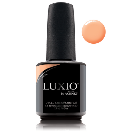 Luxio Coral orange gel nail polish for manicures and pedicures.